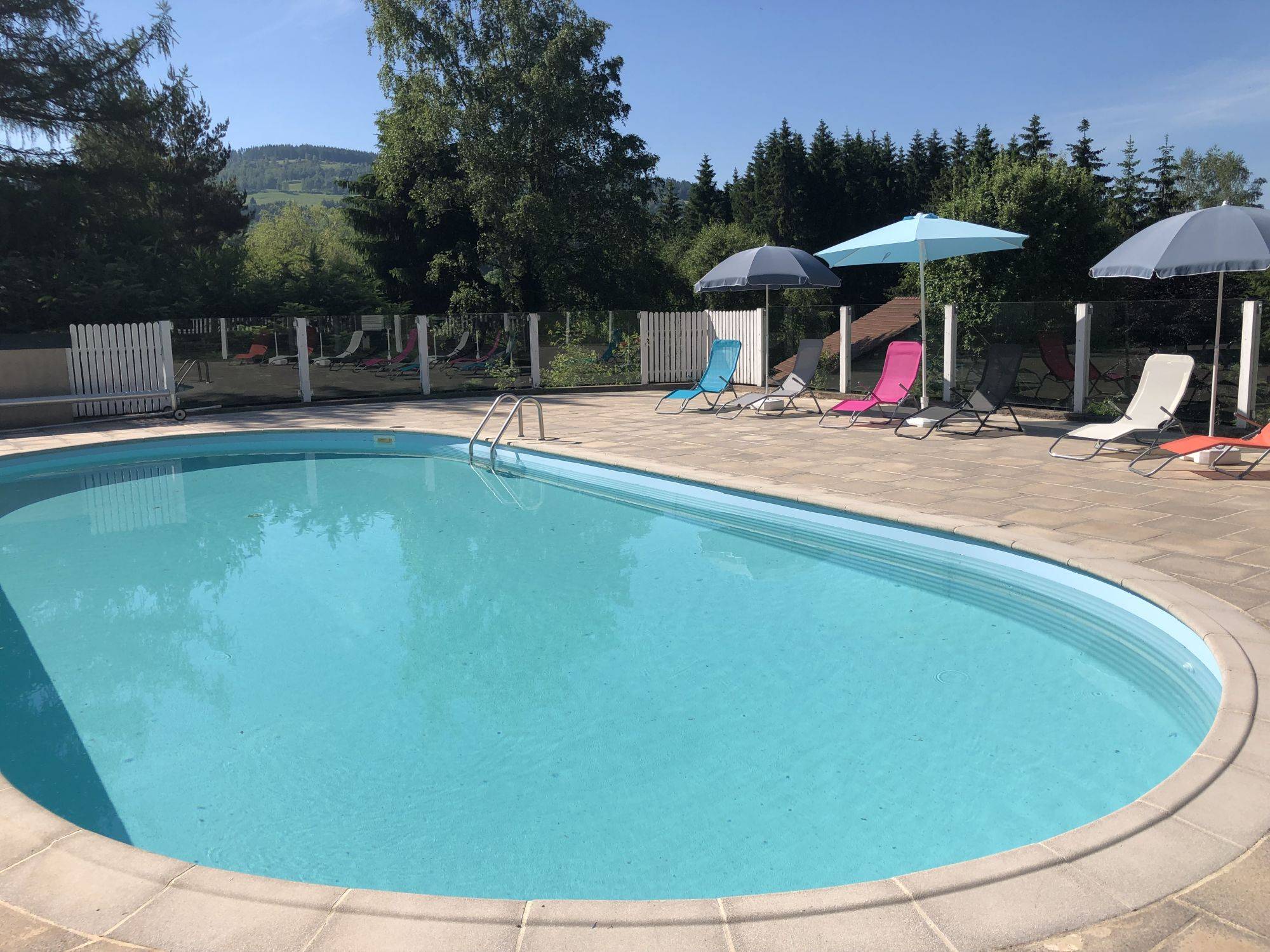 Piscine chauffée au Camping L&#8217;Orée du Bois Le Ménil Valdoie 0